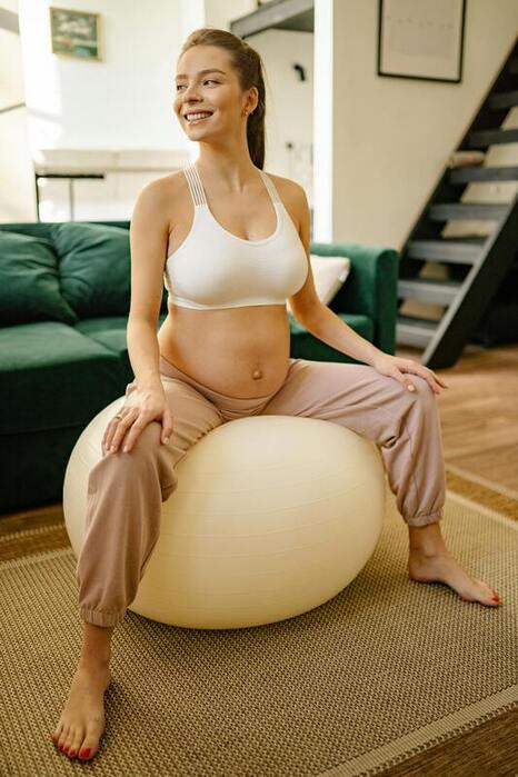Pregnant Woman on Birth Ball Utah County Doulas